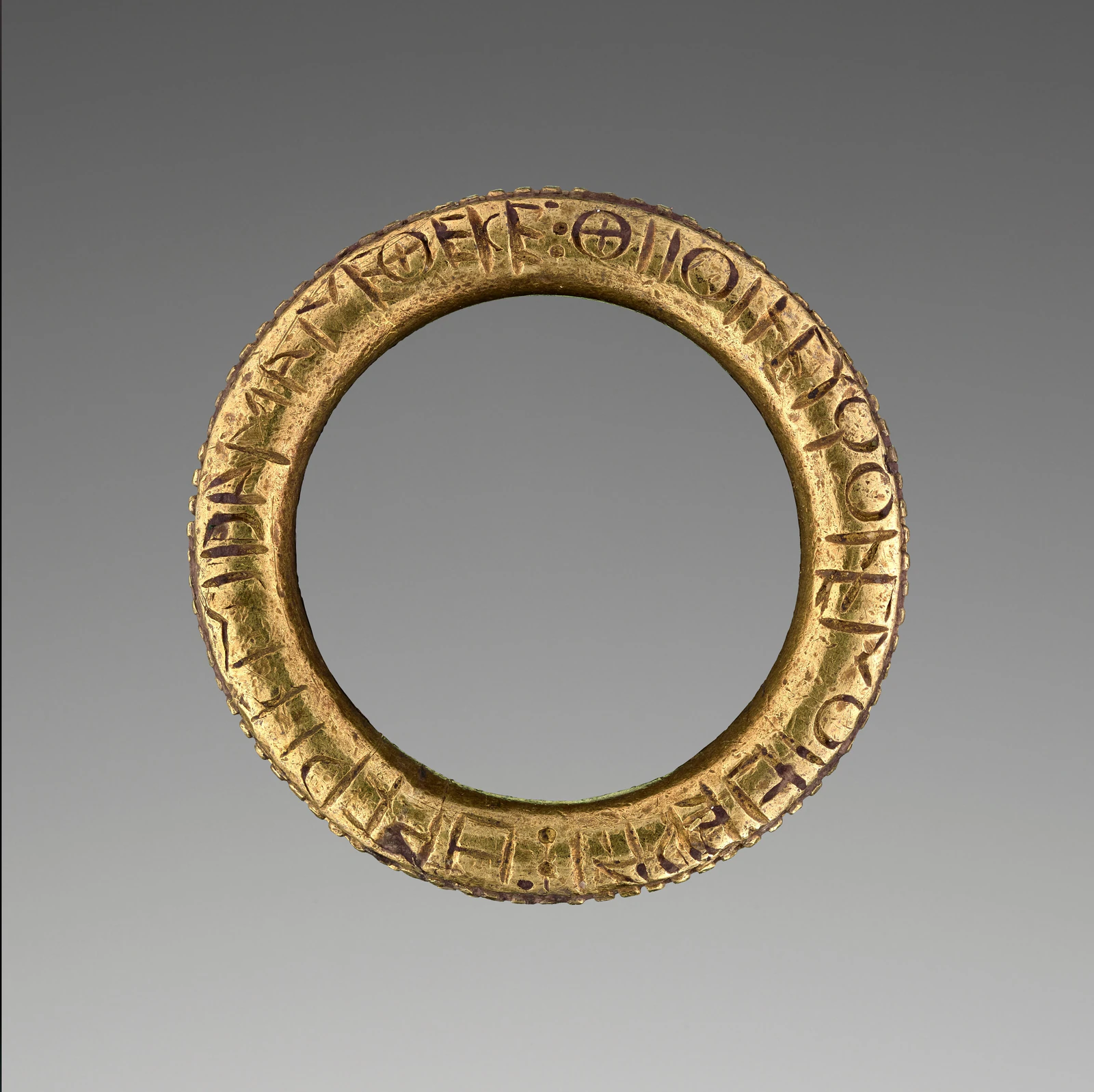Ancient gold ring with hallmark inscriptions