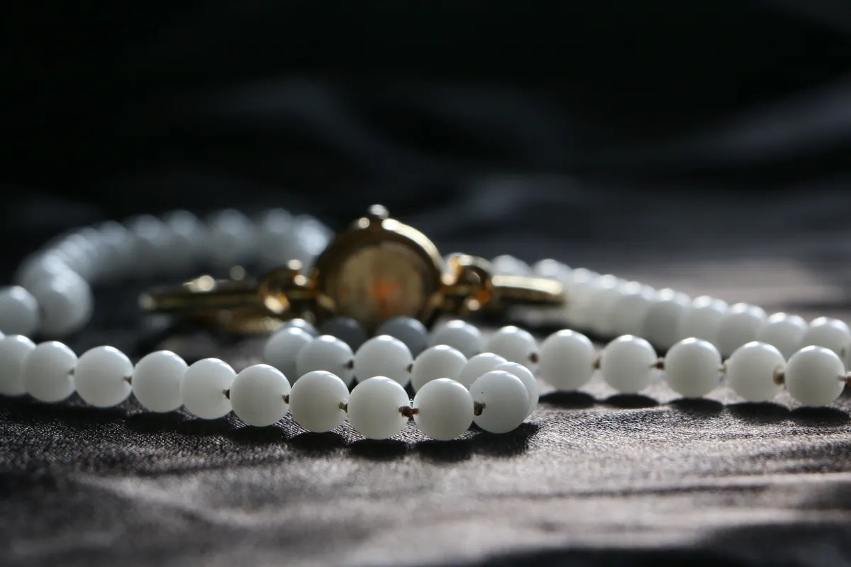 Gold-Filled (GF) hallmark stamp on jewelry — close-up identification photo