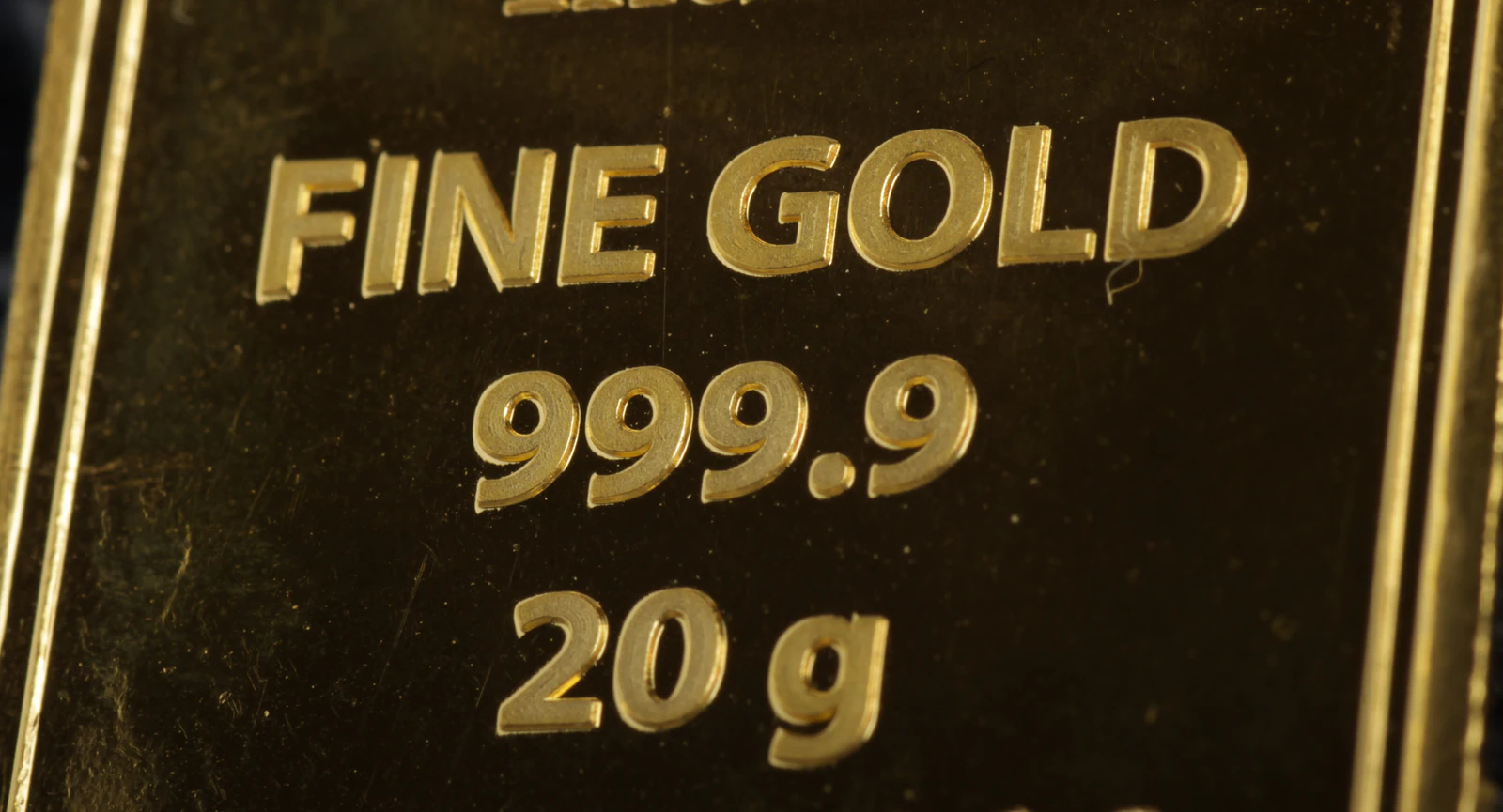 Fine Gold 999.9 stamp on a gold bar
